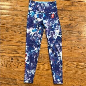 With Peloton purple/blue print leggings size medium